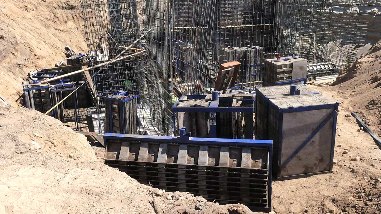 Concrete foundation contractors installing aluminum forms for a residential foundation in the Pepperwood Community in Sandy Utah